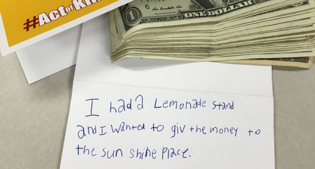 Lemonade Stand Donation A card with cash and a note.